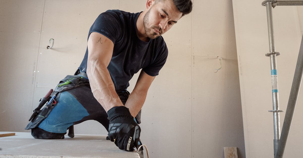 service professionnel d'installation de cloisons sèches pour des murs et plafonds impeccables, rapide et efficace.